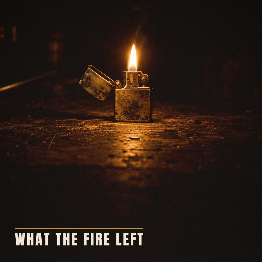 Cover of What the Fire Left: a dented lighter with a small flame on dark wood